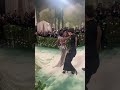 Janelle Monáe recovers gracefully after briefly losing balance at Met Gala
