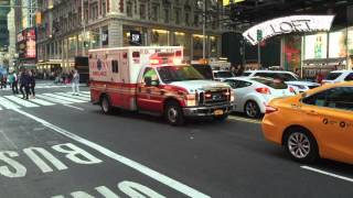 FDNY EMS AMBULANCE DOING A LITTLE DJ SIREN WHILE RESPONDING ON 42ND ST. IN TIMES SQUARE, MANHATTAN.