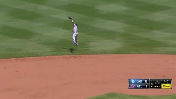 LAD@ATL: Rollins leaps to make catch, end inning