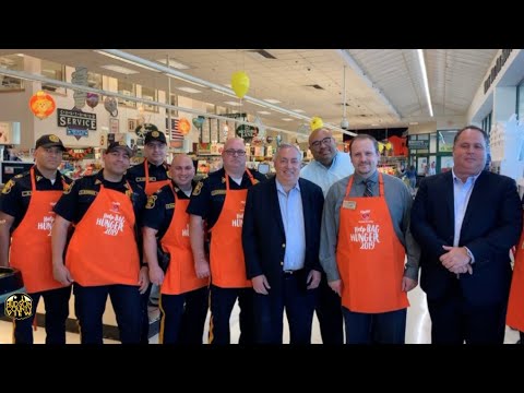 North Bergen elected officials, police officers team up with ShopRite to fight hunger