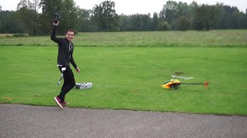 Manuel Smackdaini flying through a tree with his Logo 700