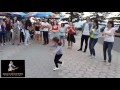 A little girl dancing at the Salsa Caliente's Open Air party