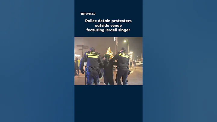 Police detain activists during protest outside Amsterdam venue featuring Israeli singer