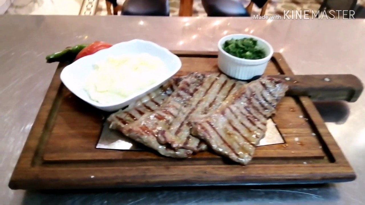 chefs Arabic Beef sirloin steak cream spinach with baked potatoes