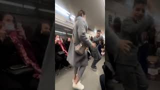 A beautiful dance of a kind girl with some musician boys in Tehran metro |