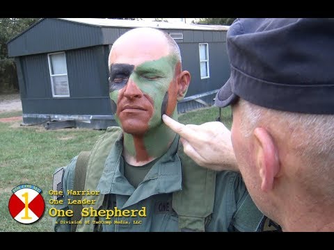 Marine with camo face paint, Nathan Rupert