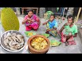 Tribe traditional cooking jackfruit rice with prawn eating by santali tribe familyindian village