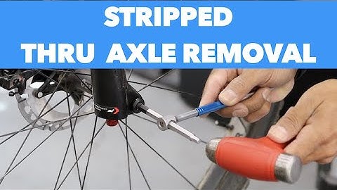 Thru Axle Removal  with a Park Tool TTH-1 and hand.