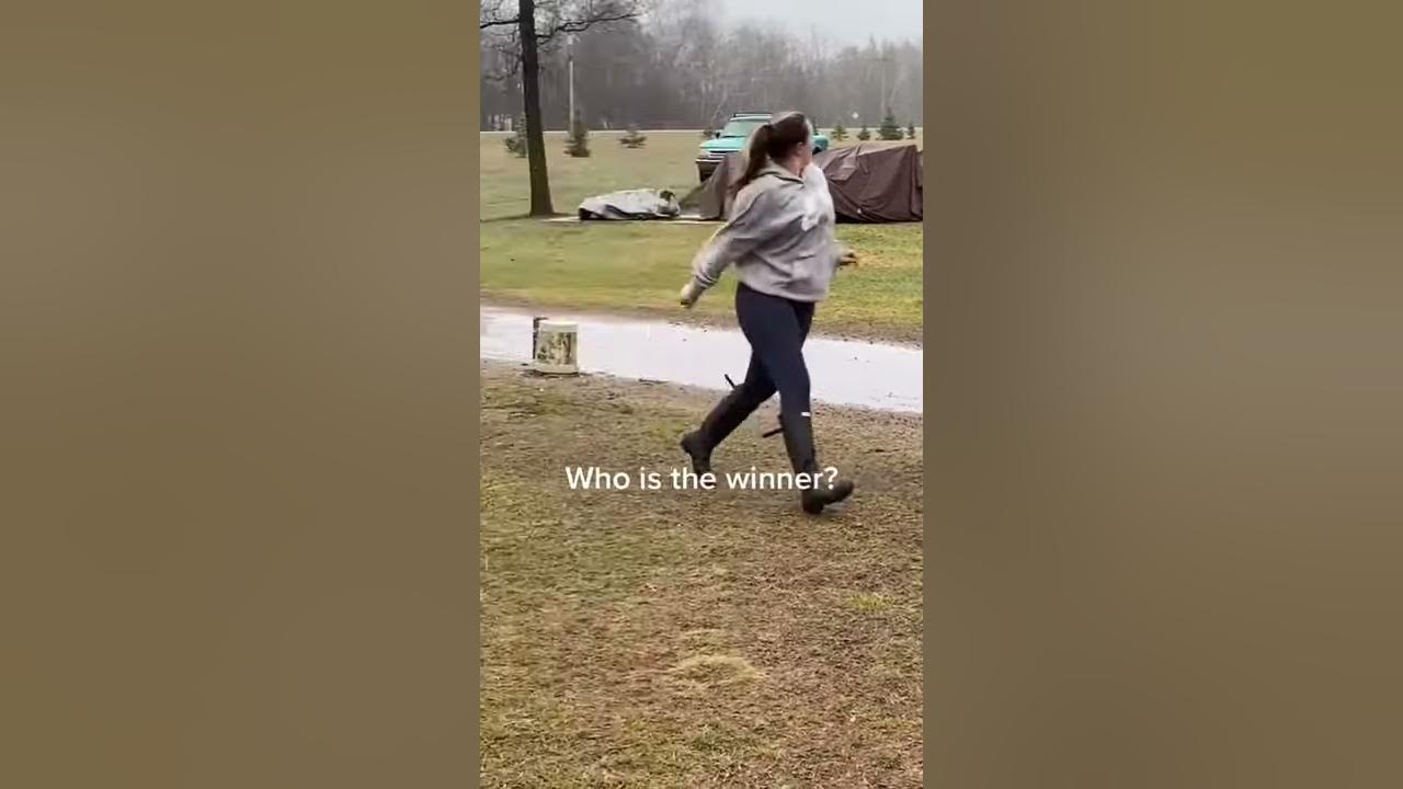 Person's leg kicking a bucket of water - SuperStock