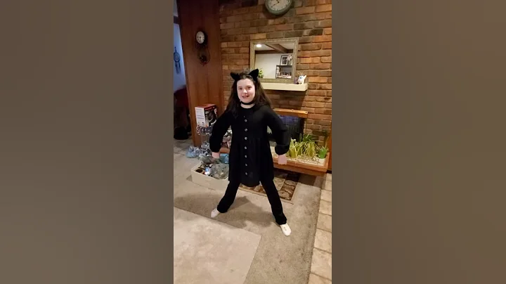 Lydia tries dressing like a cat