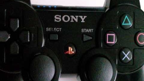 PS3 Dual Shock 3 Controller- Fitted with Rainbow PS button kit. Console House