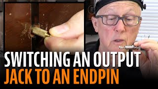 How to revert an output jack to an endpin on an acoustic guitar