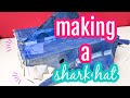 Making a shark hat out of a cardboard box