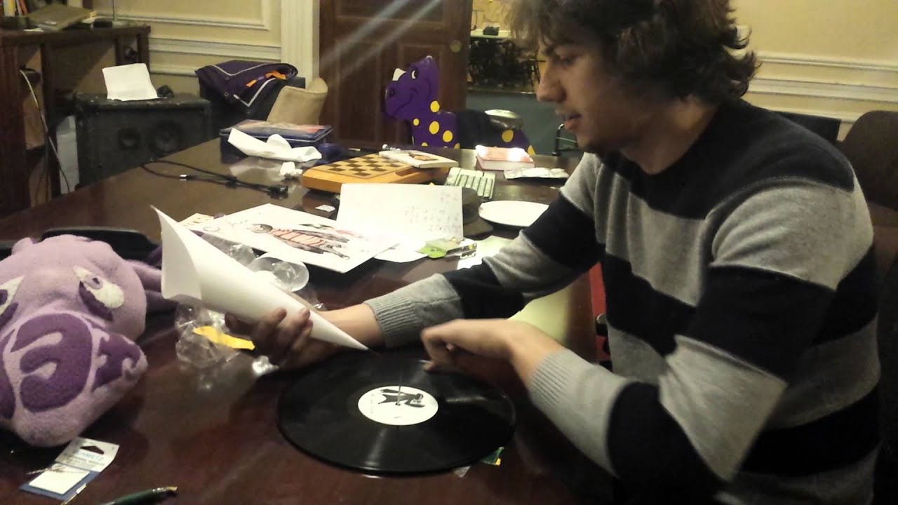 Playing a record with a needle and paper