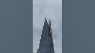 superman on top of The Shard building #london