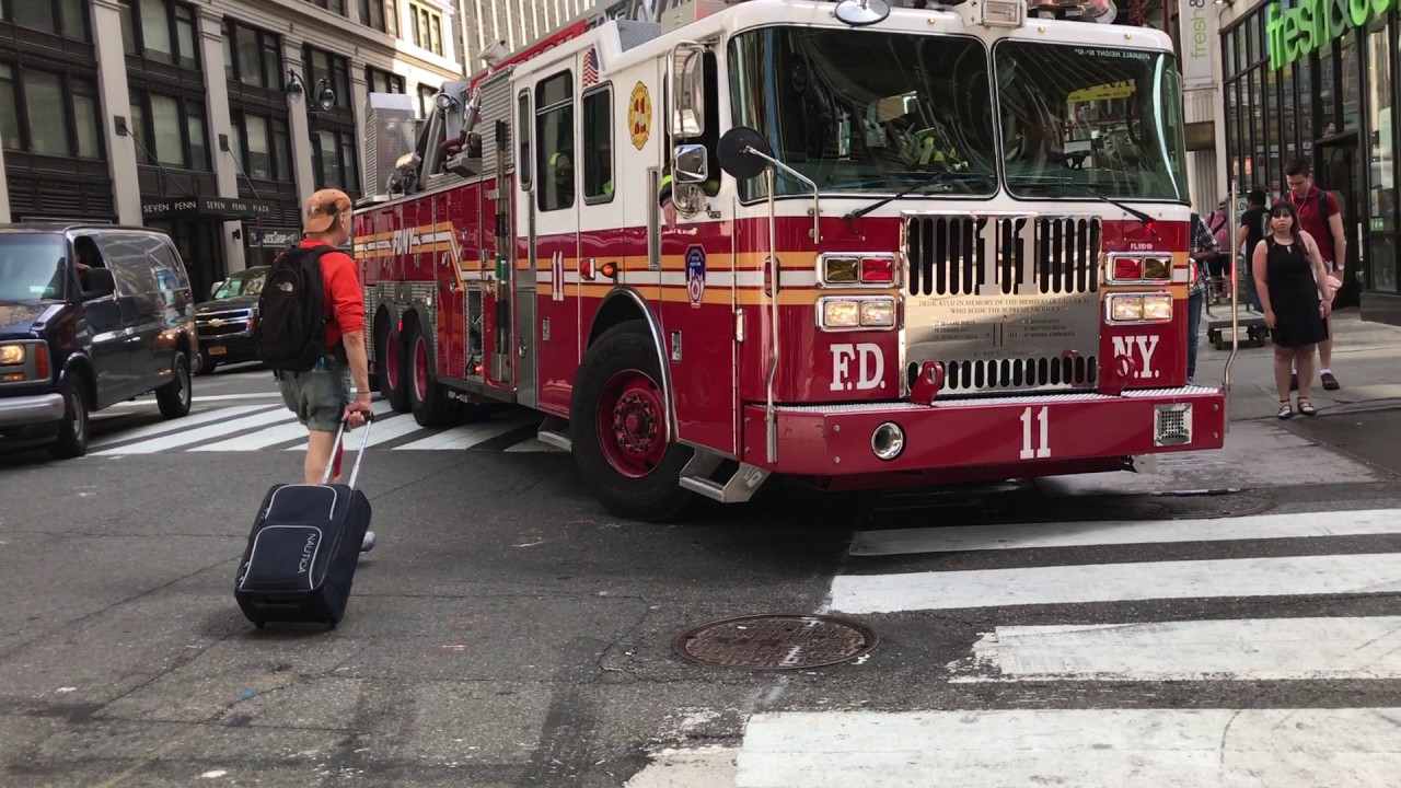 FDNY LADDER 11, ACTING FDNY LADDER 24, RESPONDING IN HEAVY TRAFFIC ON 7TH AVENUE IN MANHATTAN, NYC.
