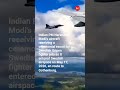 Indian PM Narendra Modi's aircraft receiving a ceremonial escort by Swedish Gripen fighter jets.