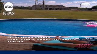 Dust devil sends pool floats flying