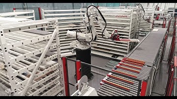 IMA Schelling Group | Flexible drilling and dowelling line with robot handling | English