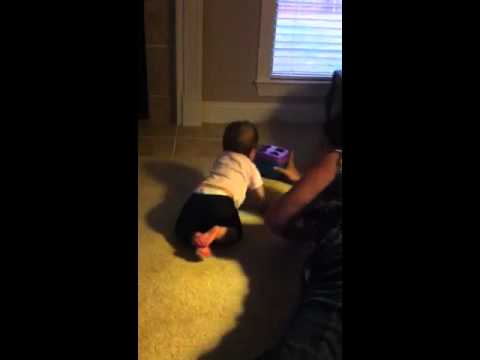 We are in trouble - she's officially crawling!