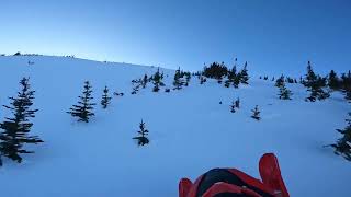 Steep snowmobile hill climb