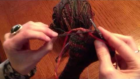 Transferring thumb stitches to waste yarn
