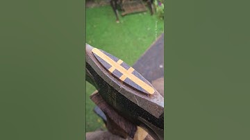 Make your axe cooler with a double cross wedge and 9mm casing