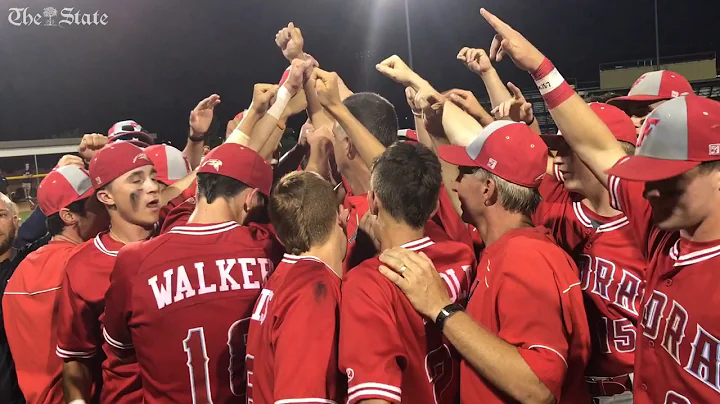 Andy Hallett talks to his team after state title