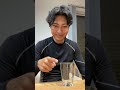 Man points to a glass of water that fills instantly
