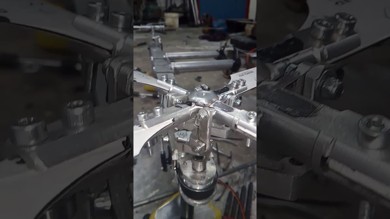 Four blade hand made rotor head for qouadcopter - YouTube