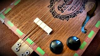 cigar box guitar de caoba africana