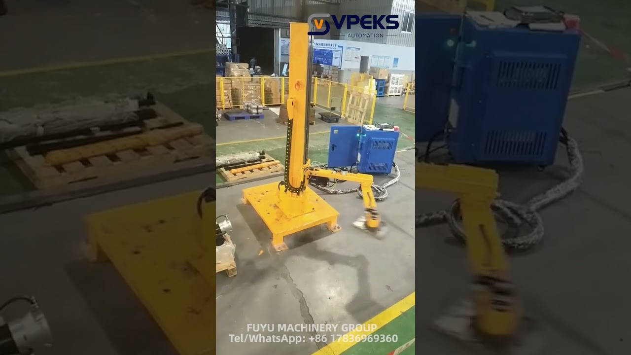 A small vertical robot palletizer with a load of 30 kg that can be dragged to be programmed