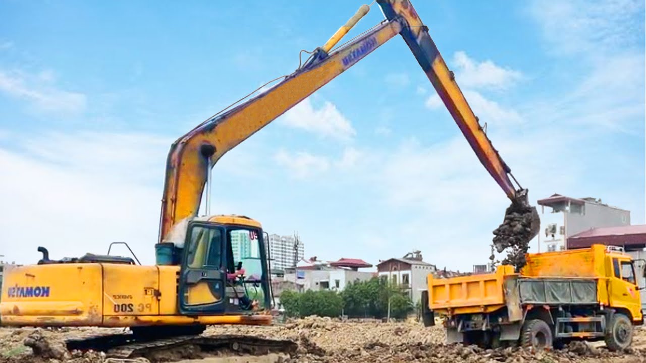 Long Reach Excavator Dredging Canal Komatsu PC200 & Trucks | Heavy ...