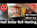 Another half dollar coin roll hunting adventure  looking for silver