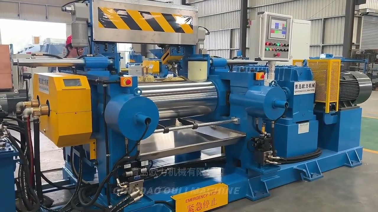 Rubber mixing mill machine safety system display. Compound rubber roller mixer machinery