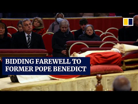 Mourners bid farewell to former Pope Benedict