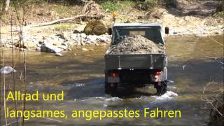 UNIMOG 411 beim Kiestransport