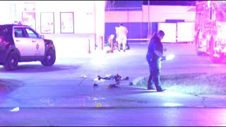 Man, 50, dies after being found shot at North Side gas station; woman in custody, police say