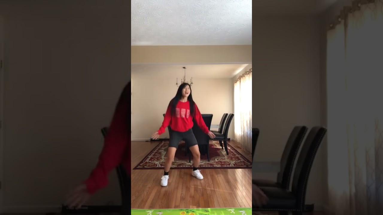 Energetic Dance Performance by Young Asian Woman