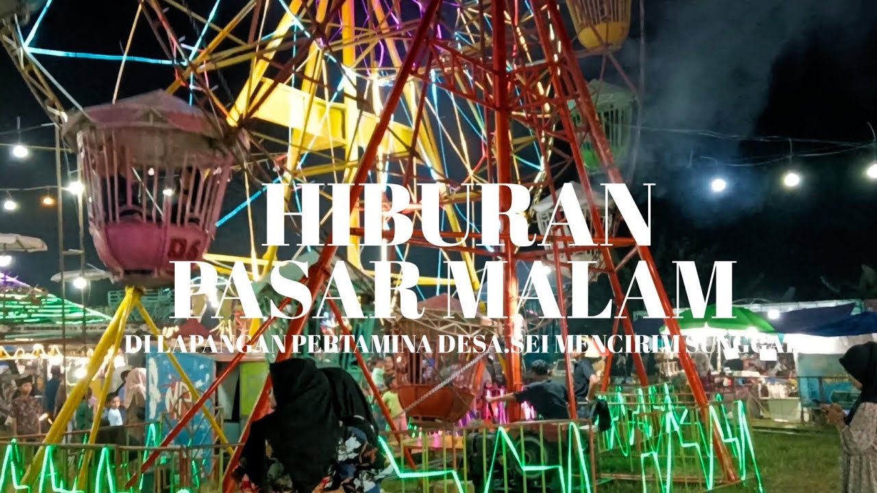 HIBURAN PASAR MALAM YANG ADA DI LAPANGAN PERTAMINA, DESA. SEI MENCIRIM SUNGGAL