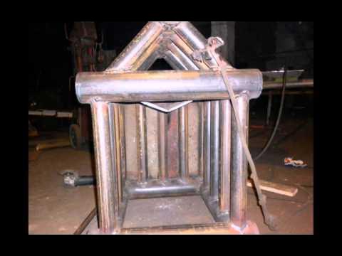 Сварить котел трубы. Теплообменник для пиролизной печи. Теплообменник для печи. Теплообменник в печь для отопления. Регистр отопления.