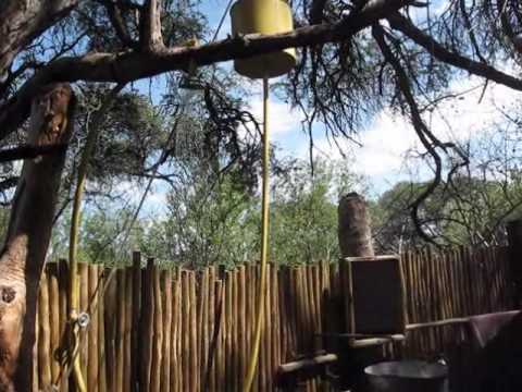 Demonstration: How a bucket makes a great shower in the Kalahari bush 