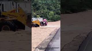 Flood Rescue By Loader Truck