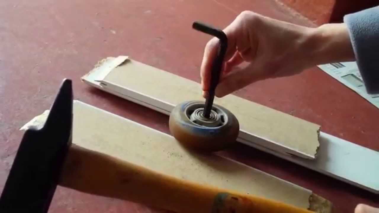 Comment démonter une roue de roller avec entretoise plastique sans clé spéciale