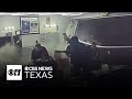 Surveillance video shows car crashing into North Texas barber shop