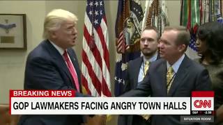 GOP lawmakers face angry crowds at town halls