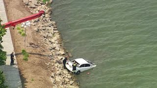 Crews pull car from Lake St. Clair after it drove in it