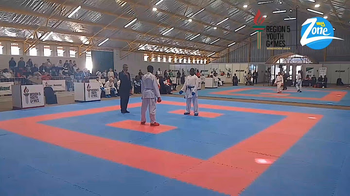 Here at the Region 5 Youth Games Karate Tournament, Vincent Juelson (Angola)(red gear) takes on