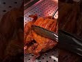 the raising stage of a roasted chicken that will soon be served#food
