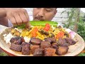 Naga mukbang eating roasted pork fats  yam fermented soyabean and fermented bamboo shoots curry